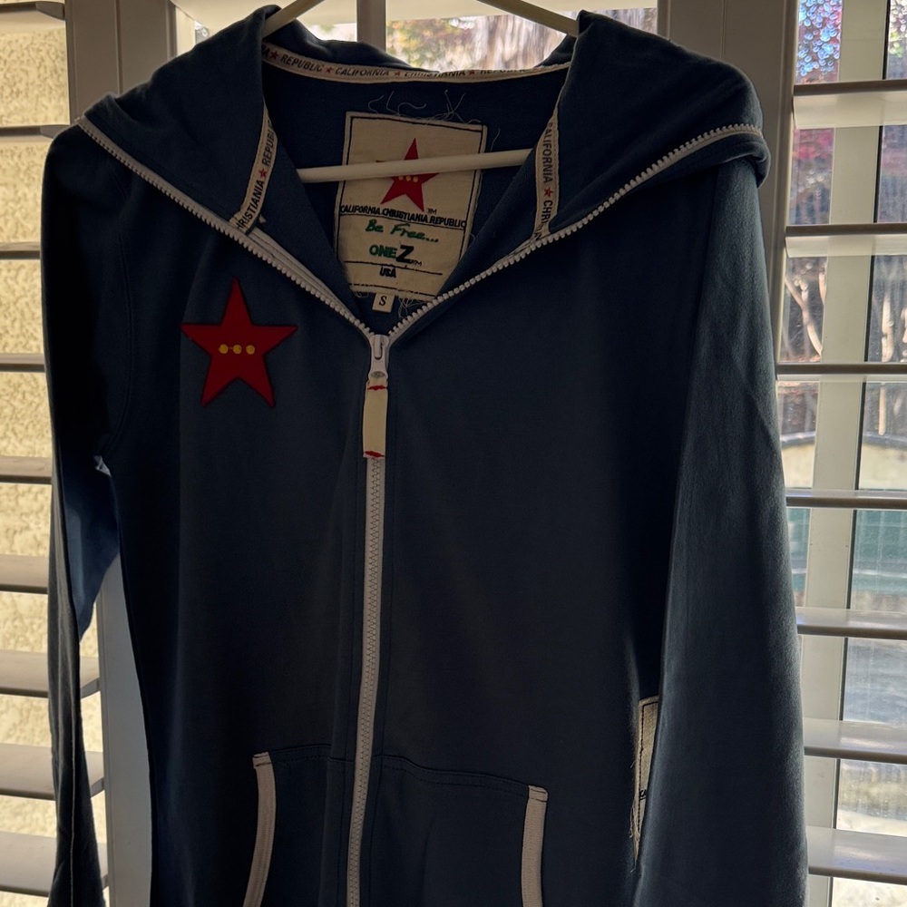 Stylish Blue Jumpsuit with Red Star Accent